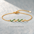 wave birthstone bracelet, flowing design symbolizing support through life's highs and lows