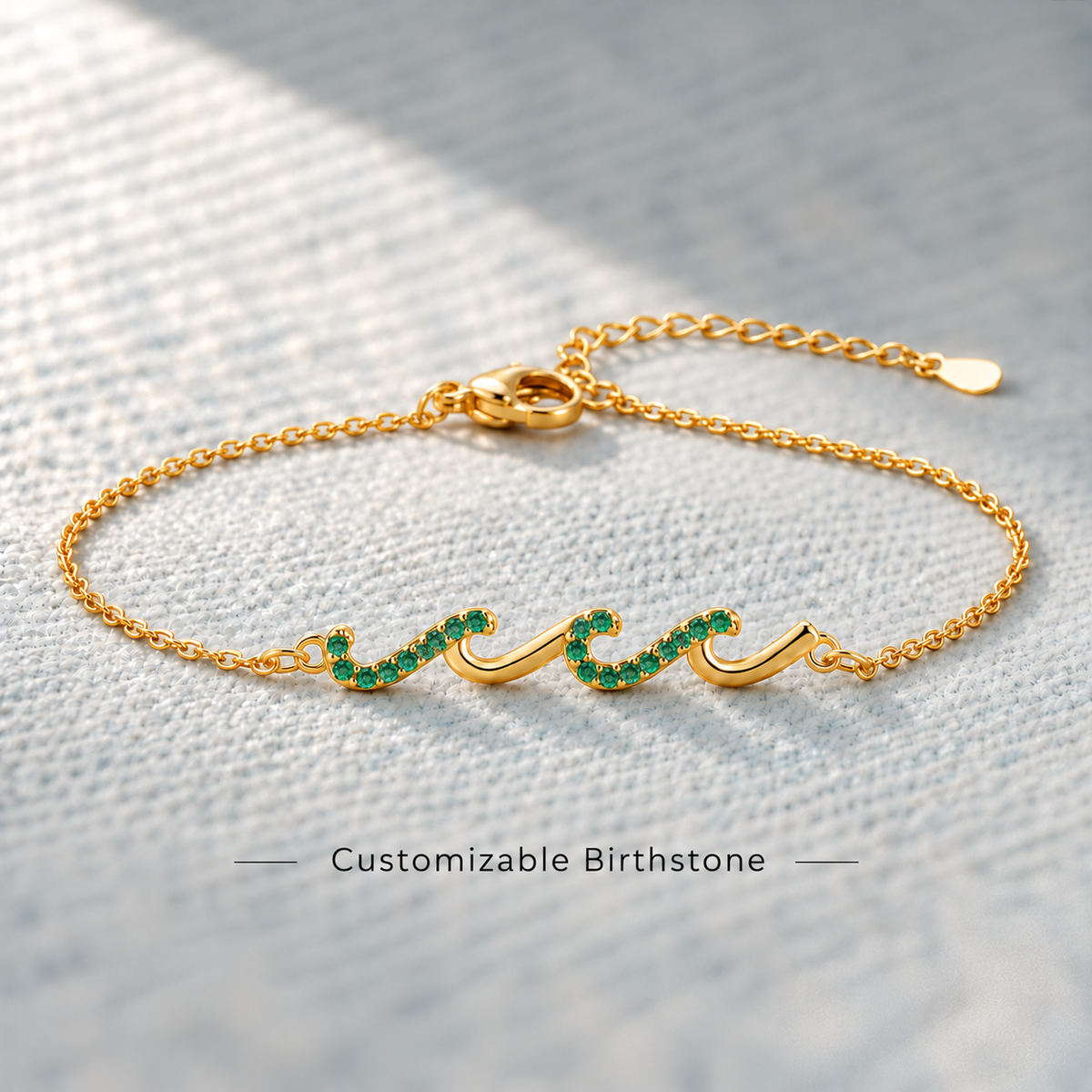 wave birthstone bracelet, flowing design symbolizing support through life's highs and lows