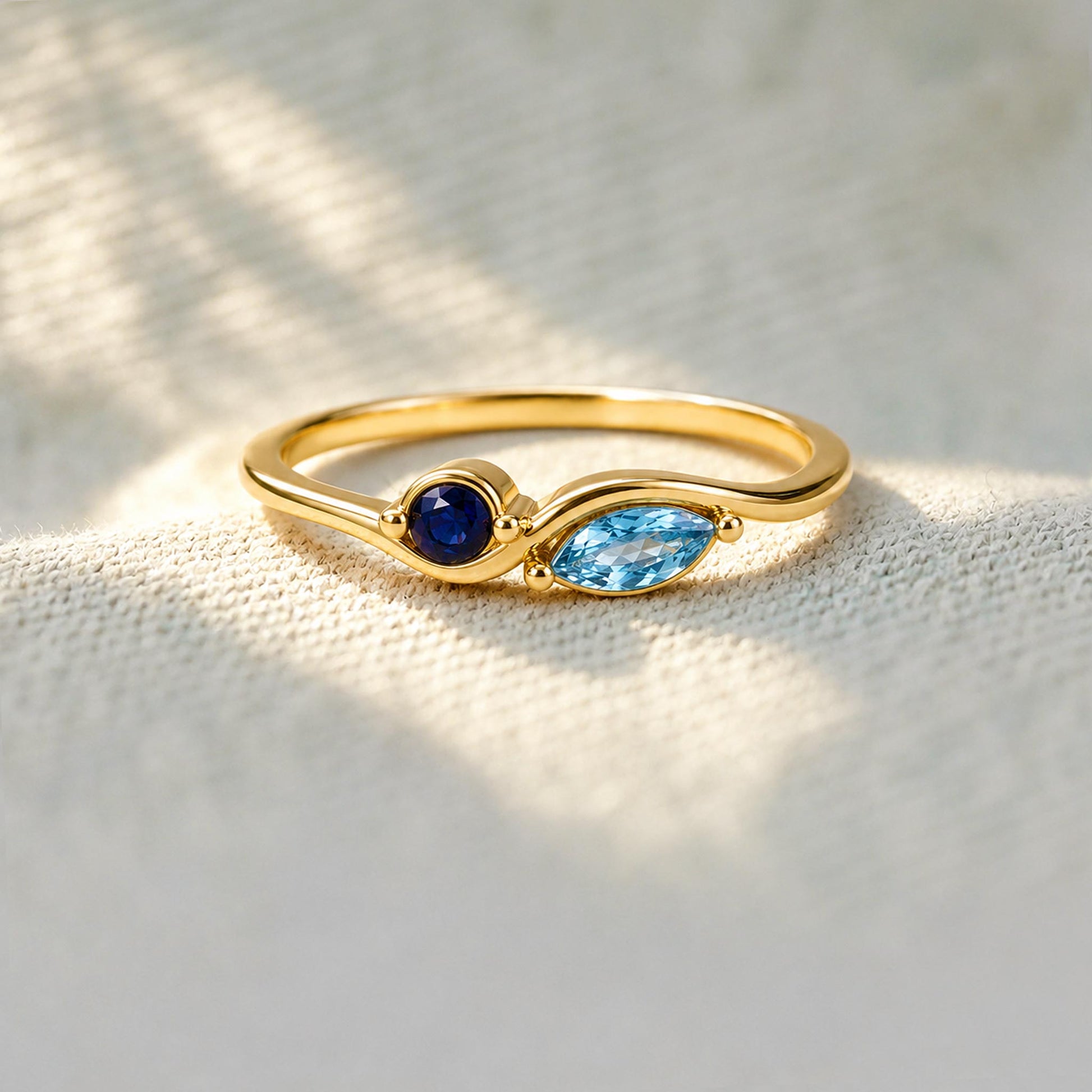 round and marquise birthstone ring design